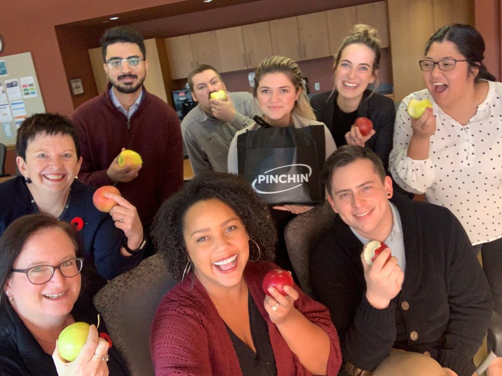 Sudbury Chamber of Commerce enjoying their apples