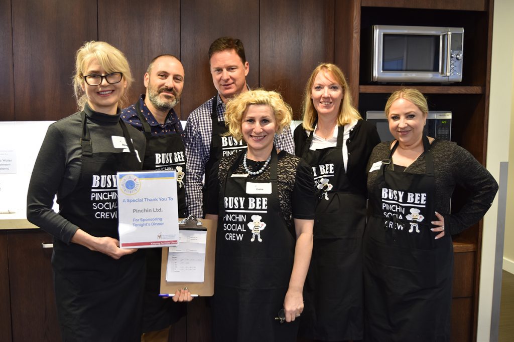 Pinchin Team posing before the Hamilton Ronald McDonald House dinner rush