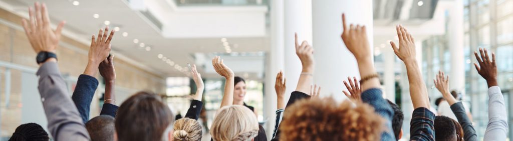 A group with their hands raised