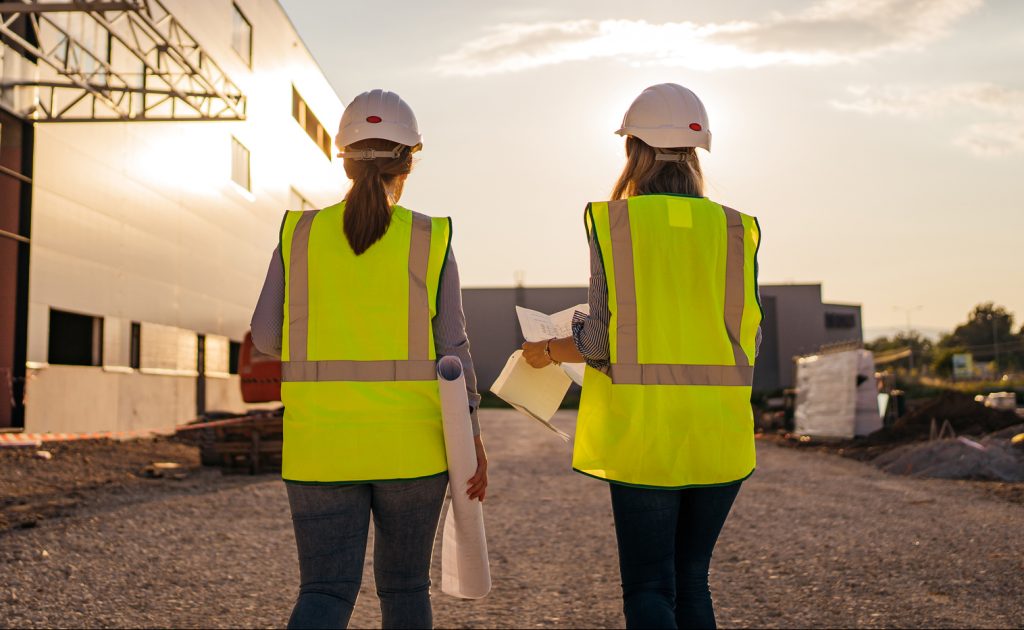 Female inspectors overseeing a construction site